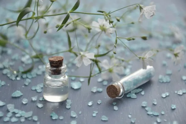 Massage oil and bath salts with flowers